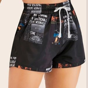 Black drawstring graphic shorts